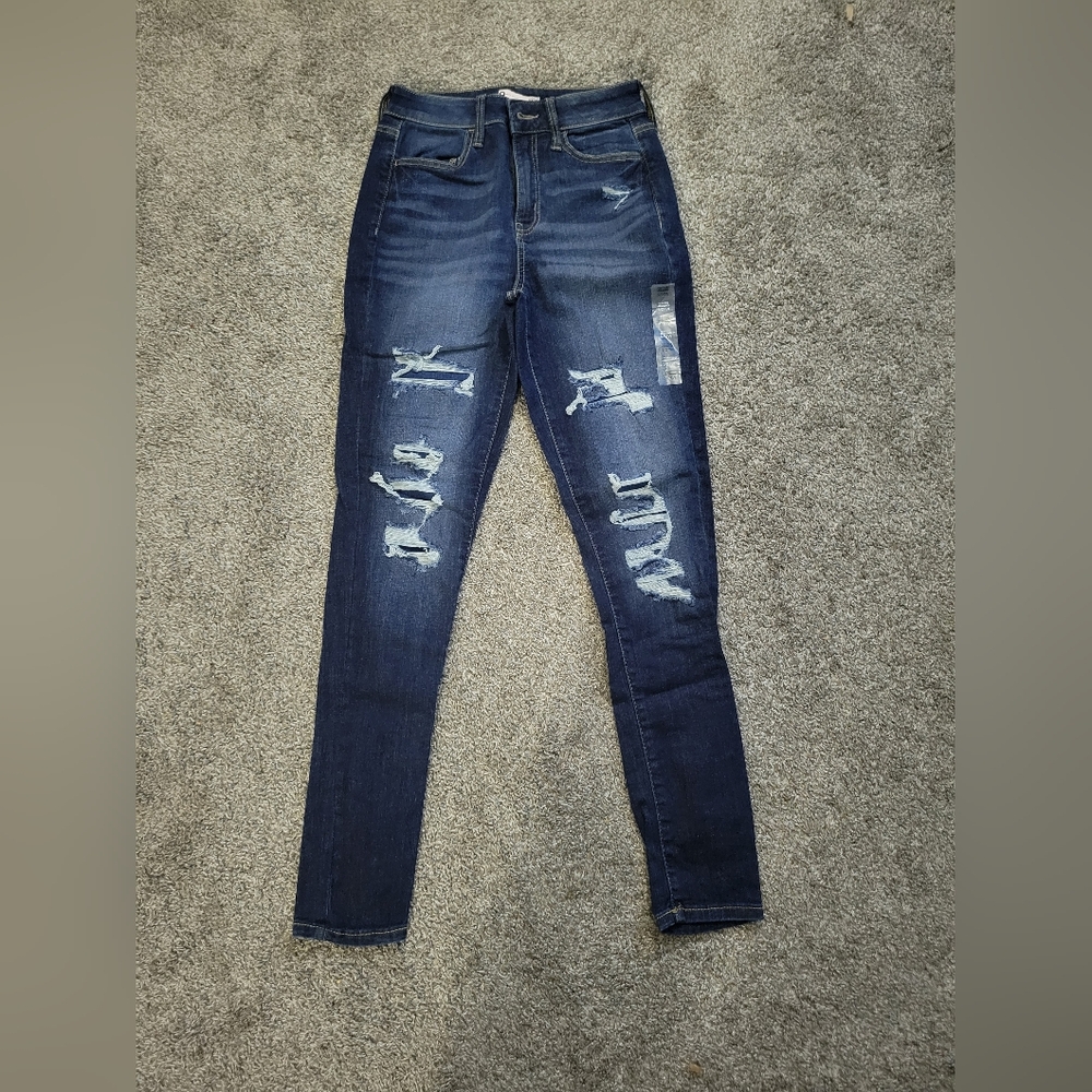 Women's Distressed Blue Jeans